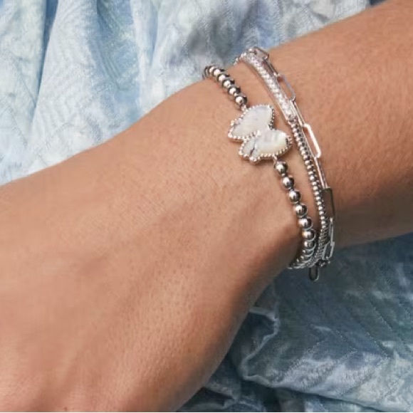 HP! NWT Kendra Scott Haley Bow Silver Stretch Bracelet in Ivory Mother-of-Pearl - Picture 2 of 7